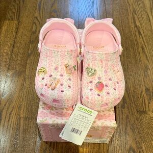 Brand new LSF CROCS Light Pink Clogs with Fun Charms.  Size 2.